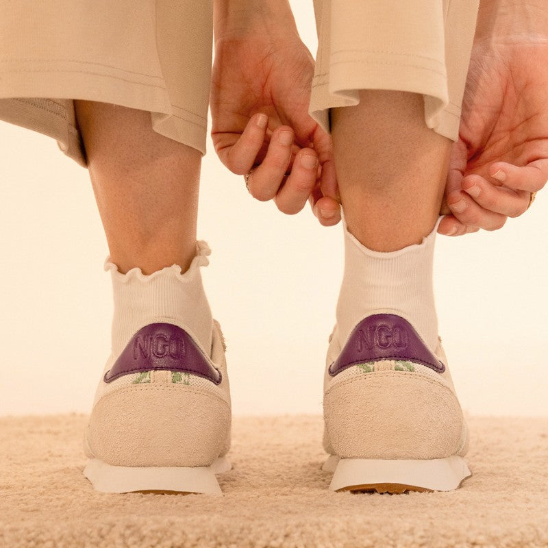 N'GO Hoi An Sneaker mit sportlichem Design – mintgrüne Basis mit lila Akzenten